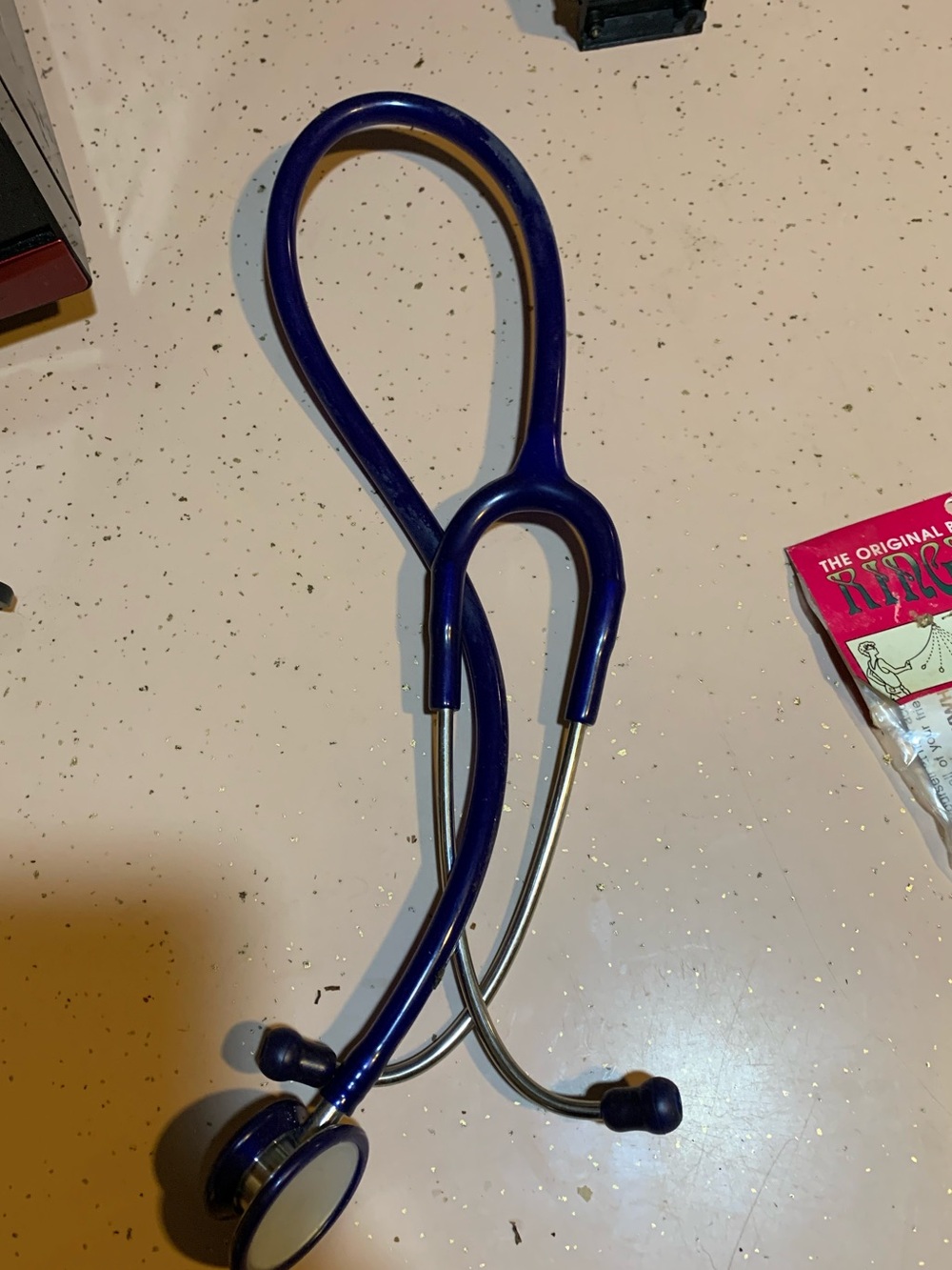 a 3M Littmann Classic II S.E. Stethoscope in navy blue.